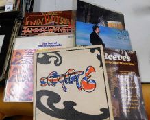 Approx. 60 vinyl LP's & records of country & easy