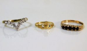 A 9ct gold ring twinned with a small gold ring & a