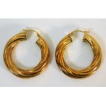 A pair of 9ct gold hoop earrings 4.7g
