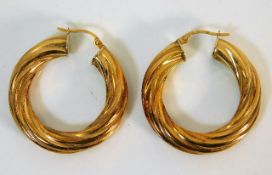 A pair of 9ct gold hoop earrings 4.7g