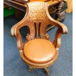 A 19thC. Captains chair with cast iron base with c