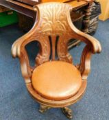 A 19thC. Captains chair with cast iron base with c