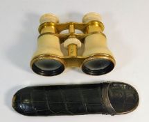 An antique ivory cased set of opera glasses twinne