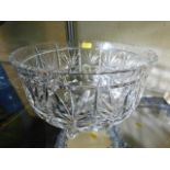 A large cut glass punch bowl