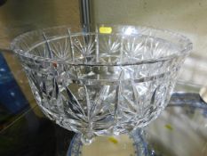 A large cut glass punch bowl