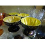 Four Maling lustreware grapefruit dishes