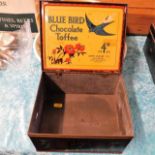 A Bluebird chocolate toffee box, tarnished twinned with three stoneware hot water bottles