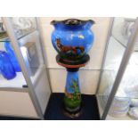 A Torquay pottery jardiniere & stand, crack to jar