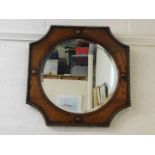 A 1920's oak framed mirror