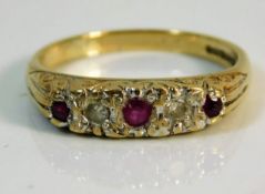 A 9ct gold ring set with diamond & ruby size N 2.6