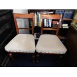 A pair of c.1900 upholstered mahogany chairs