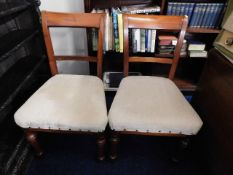 A pair of c.1900 upholstered mahogany chairs