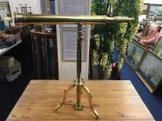 A brass adjustable telescope