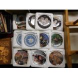 A quantity of decorative collectors plates