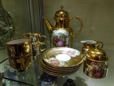 A gilded porcelain German coffee set