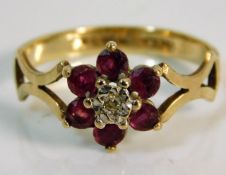 A 9ct gold ring set with diamond & ruby size O 1.9