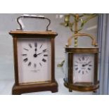 Two brass carriage clocks, one Page & Keen, Plymou