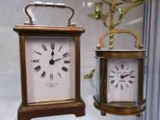 Two brass carriage clocks, one Page & Keen, Plymou