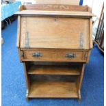 A slimline oak bureau bookcase