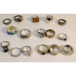 Sixteen silver & white metal rings