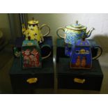 Four decorative enamelled teapots