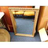 A gilt framed mirror 34in x 24in