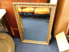 A gilt framed mirror 34in x 24in