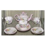 Shelley Wild Flowers pattern tea for one comprising: teapot with stand, cup, saucer, cream jug and