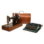 Oak-cased Singer sewing machine, together with a Remington typewriter (2) Condition: