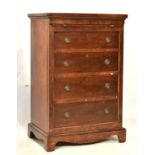 Early 20th Century walnut and mahogany chest of drawers with brushing slide, 60cm wide Condition: