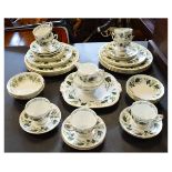 Coalport tea and dinnerwares with green foliate decoration Condition: