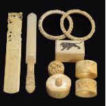 Collection of 19th Century Chinese and Japanese carved ivory items comprising: two bangles,