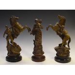 Three spelter figures comprising: a pair of 'Marly Horses' , together with a female figure on