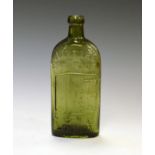 WITHDRAWN - Warner's Safe Cure bottle in green, moulded pictorial decoration and script, 18.5cm