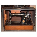 Early 20th Century Singer sewing machine in original case of issue Condition: