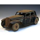 Early 20th Century tin plate clockwork saloon police car Condition: