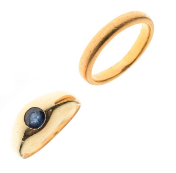 22ct gold wedding band, size T and a dress ring set sapphire coloured stone, the shank stamped
