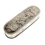 Victorian oval box having embossed decoration in the Dutch style depicting musicians in a garden,