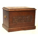 Late 19th Century stipple-and-chip-carved log bin with brass carry handles, punched decorated to