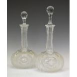 Pair of cut glass spirit decanters with star-cut bases Condition: