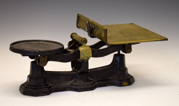 Pair of late 19th/early 20th Century J.S. Fry & Sons brass and iron scales, having a central brass