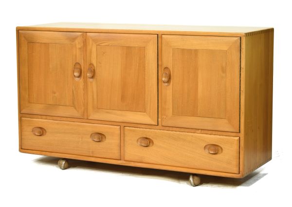 Modern Design - Ercol light elm sideboard, fitted three cupboard doors with two drawers below