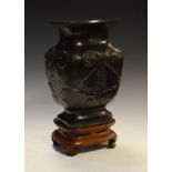 Oriental patinated bronze rectangular baluster shaped vase having lobed and character decoration