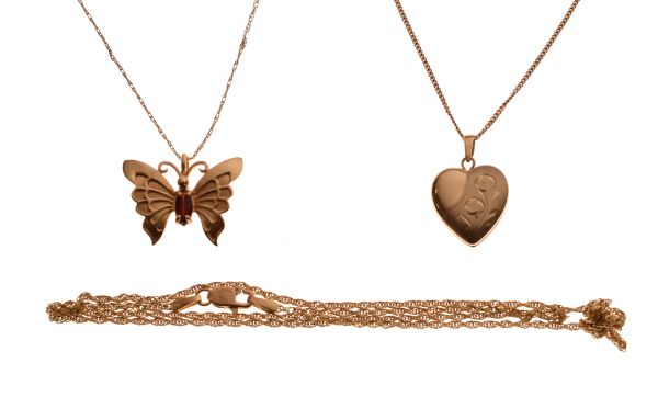 Butterfly pendant stamped 10k on fine chain, a heart shaped locket stamped 14k GF on fine chain, and