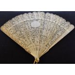 19th Century Chinese Canton carved ivory brisé fan, typically decorated with figures Condition: