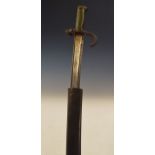 19th Century French bayonet, the sheath stamped 23155, the curved hilt A19690, the 57cm fullered