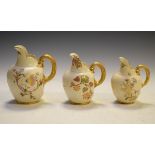 Three graduated Royal Worcester 'Flatback' jugs, shape 1094, various marks and dates, largest 15.5cm