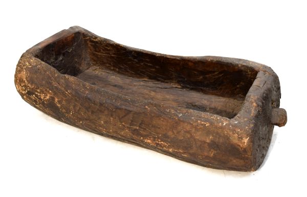 Rustic wooden trough of dug-out design, 77cm wide excluding lug Condition: