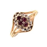 Dress ring set diamonds and four ruby coloured stones, the shank stamped 14K, size K½, 2.8g approx