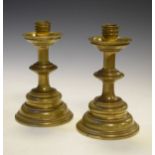 Pair of 19th Century brass candlesticks, each sconce with drip-tray, knopped column standing on a